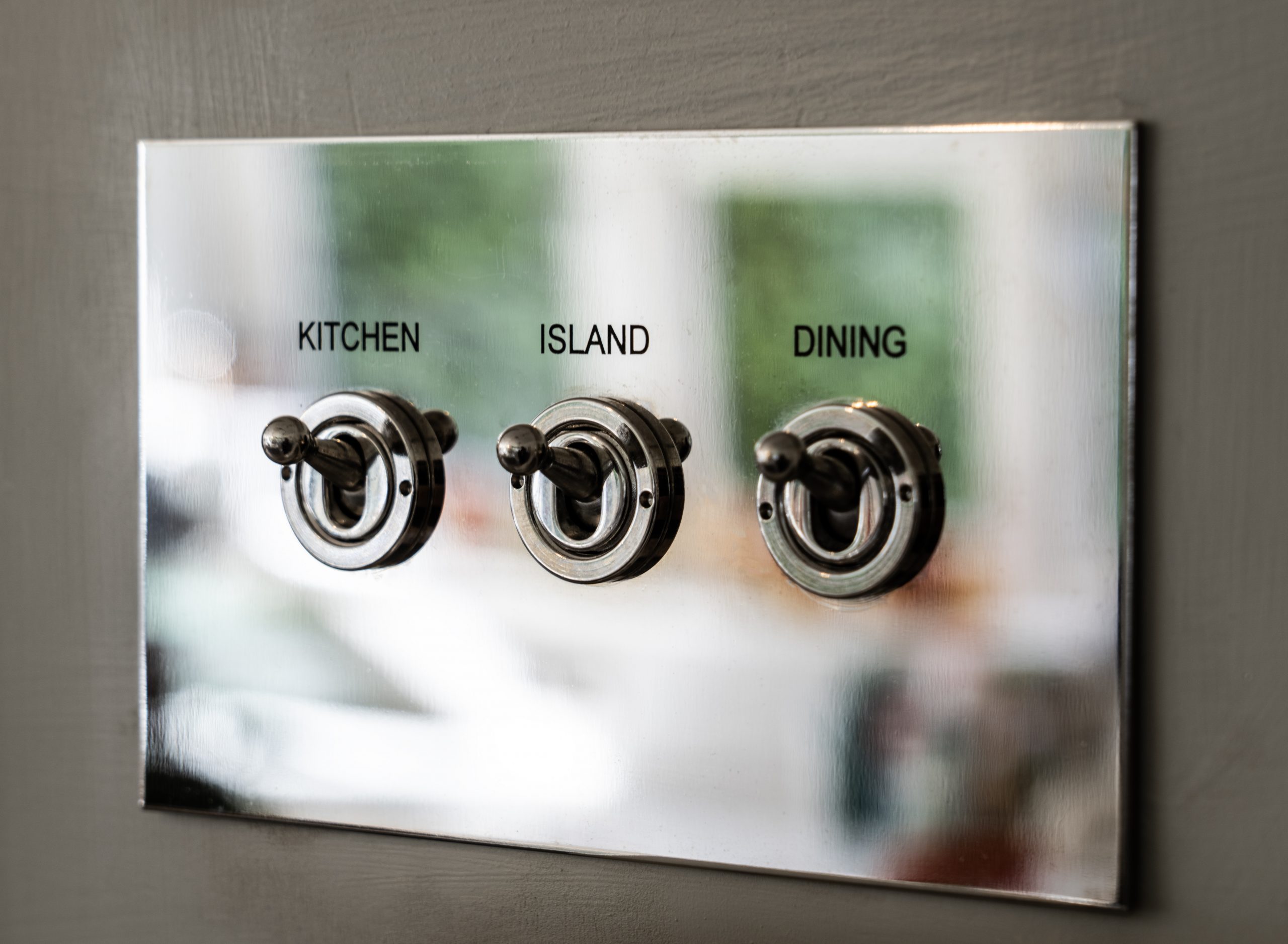 Engraved kitchen, island and dining lighting controls installed in the Purley on Thames home
