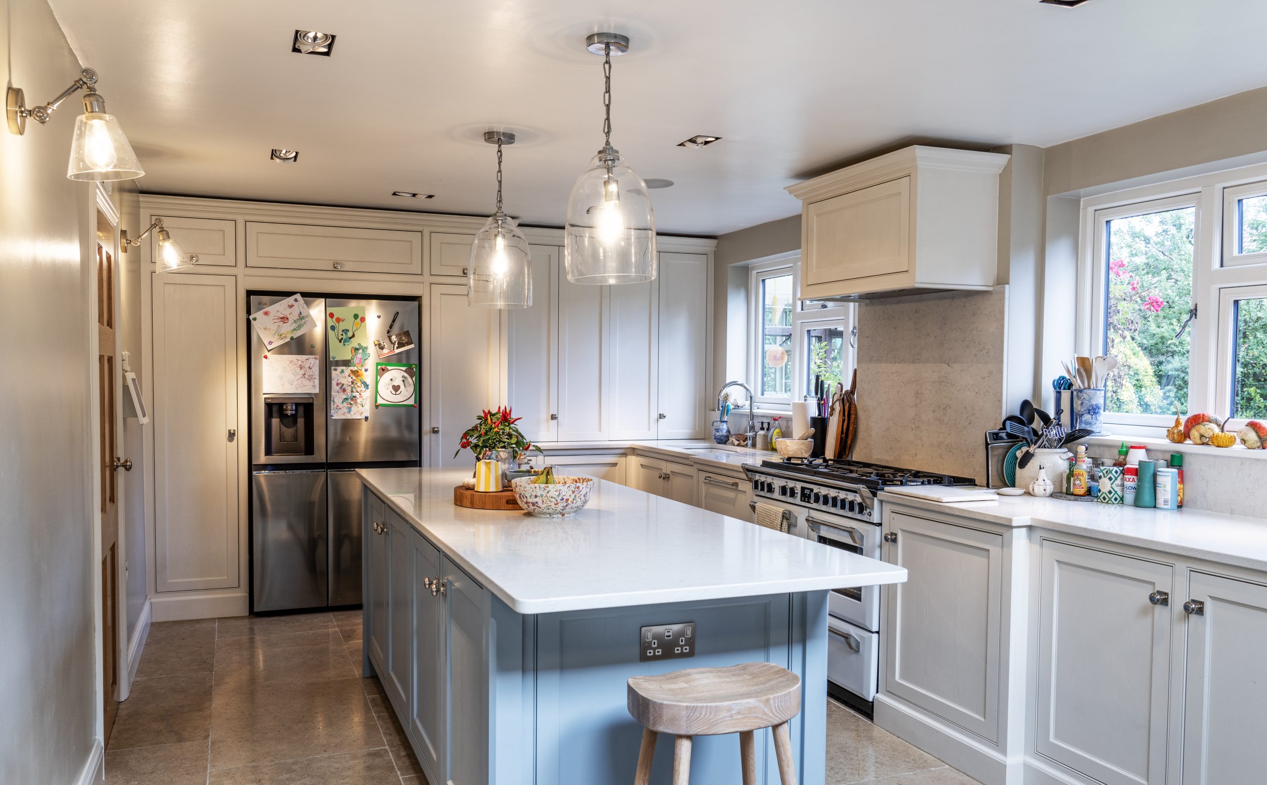 Finished Purley on Thames kitchen and dining space with layered lighting and connected-home electrical details