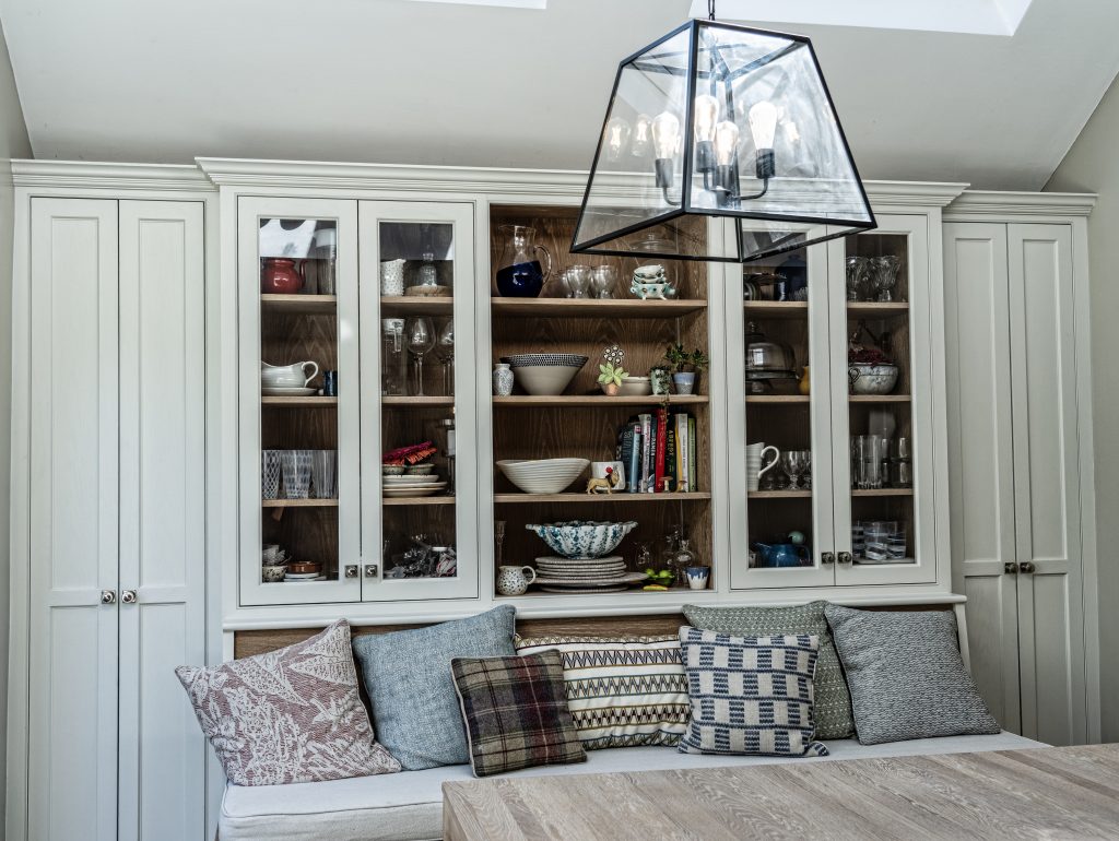Pendant and recessed lighting above the Purley kitchen island and dining area