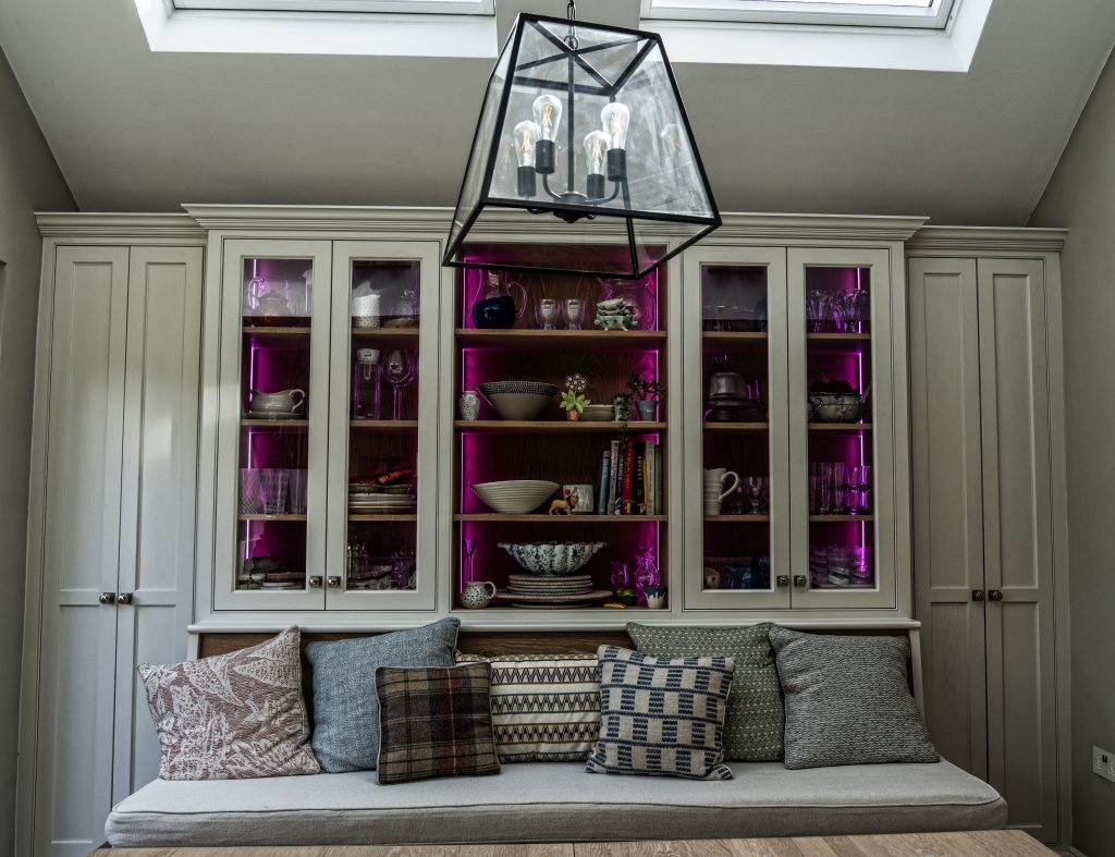 Integrated coloured cabinetry lighting in the Purley on Thames kitchen
