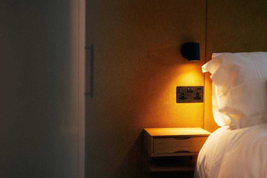 Bedroom bedside electrical accessories and wall light